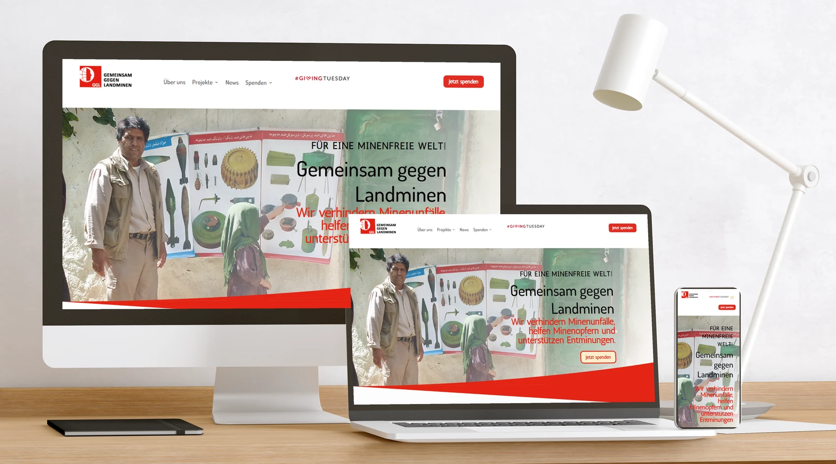 Website Gemeinsam gegen Landminen auf Bildschirm, Laptop und Handy