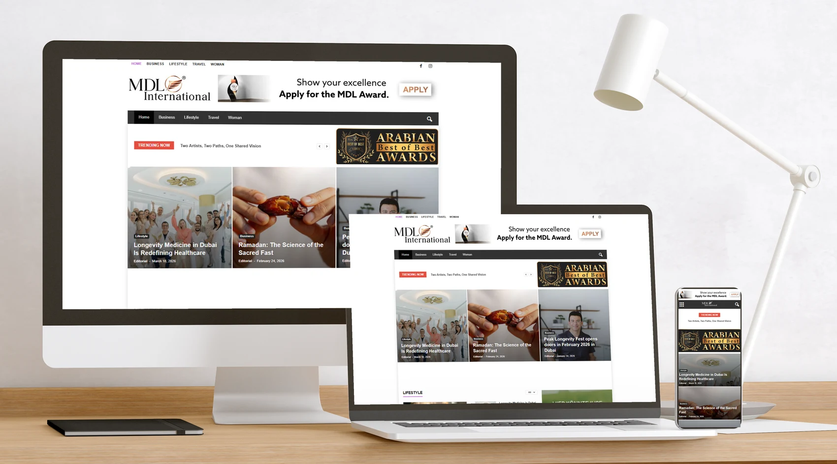 Website MDL Online-Magazin auf Bildschirm, Laptop und Handy